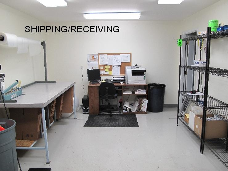 A room with boxes and shelves in it