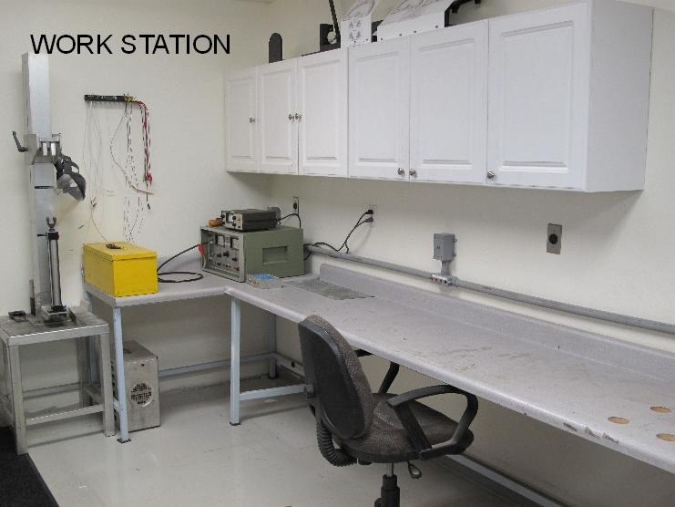 A work station with a chair and desk.
